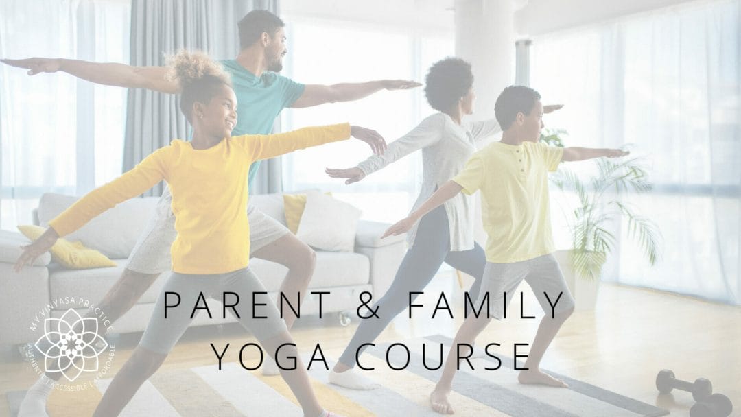 A family practices yoga together in a bright room